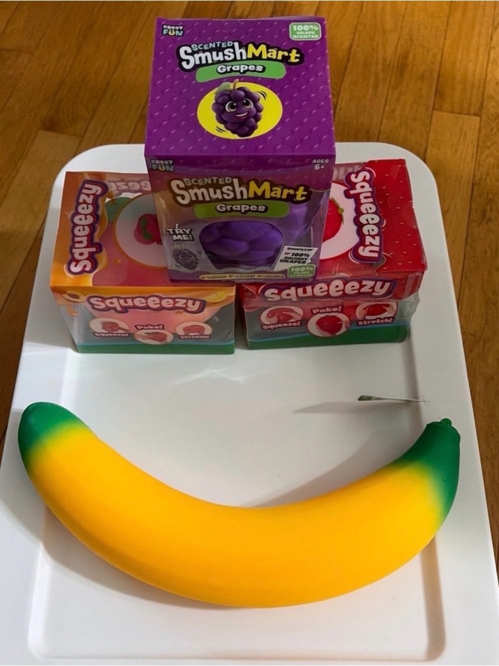 Squeeezy & SmushMart Grape peach and strawberries with Banana Stress Toy